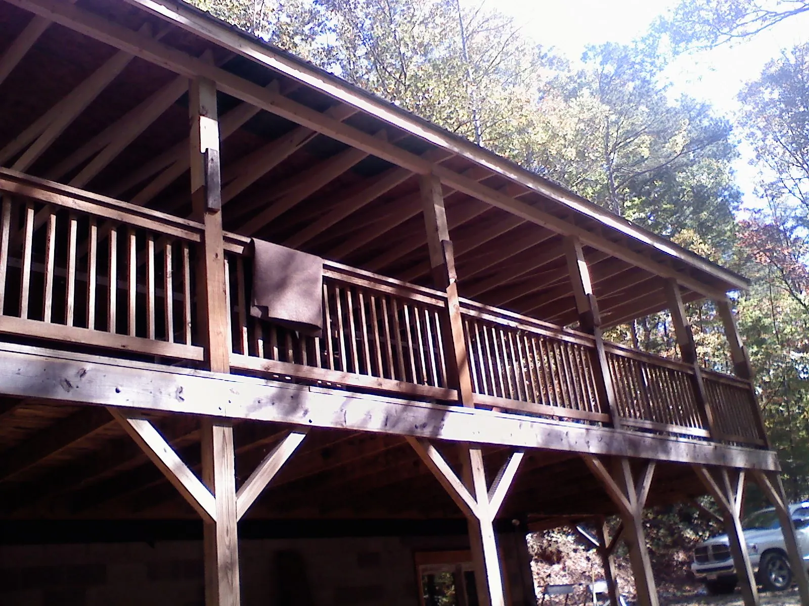 Timber framing under a new elevated porch and deck — Roof Leak Repair in New River by Roofing Brothers